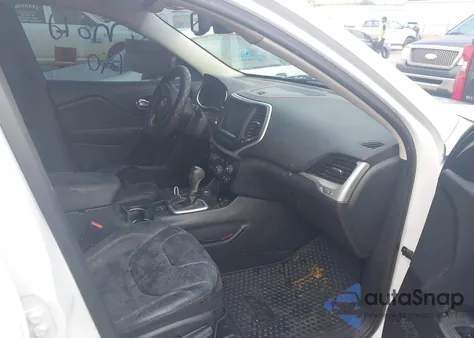 2015 Jeep Cherokee Trailhawk from USA, damaged, VIN 1C4PJMBS9FW705080